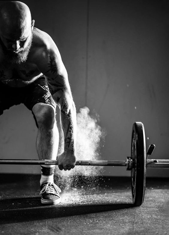 Athlete Lifting Barbell